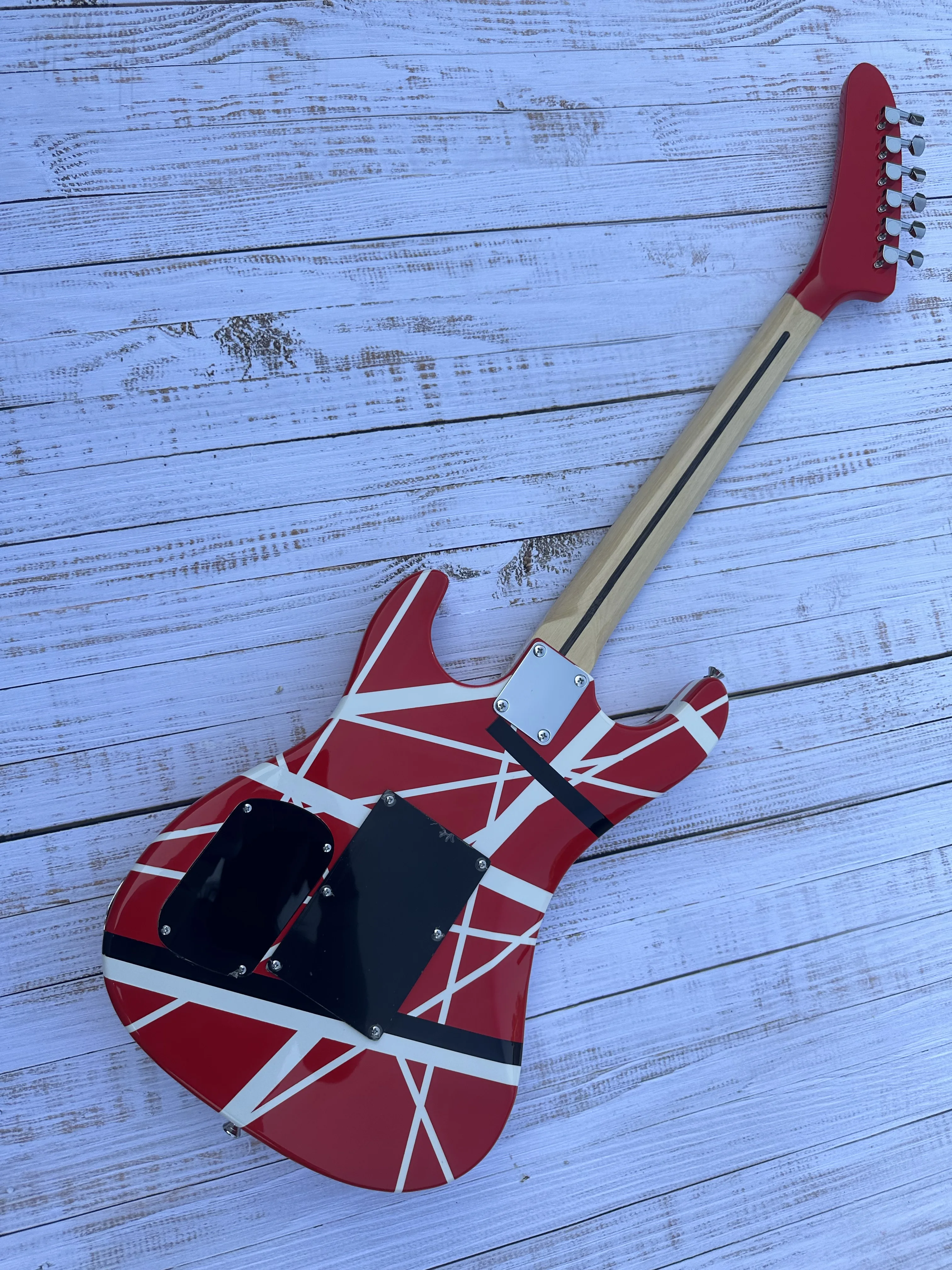 5150 electric guitar, imported alder body, Canadian maple fingerboard, signed, classic red and white stripes, lightning package