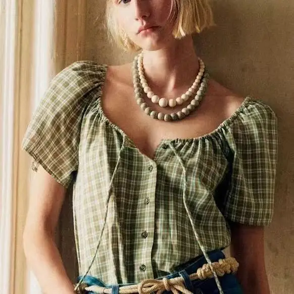 

Лето 2025: Новая свободная блузка с коротким рукавом, клетчатым принтом, бантом на шнурке и большим круглым вырезом, из хлопка, с рукавами-фонариками