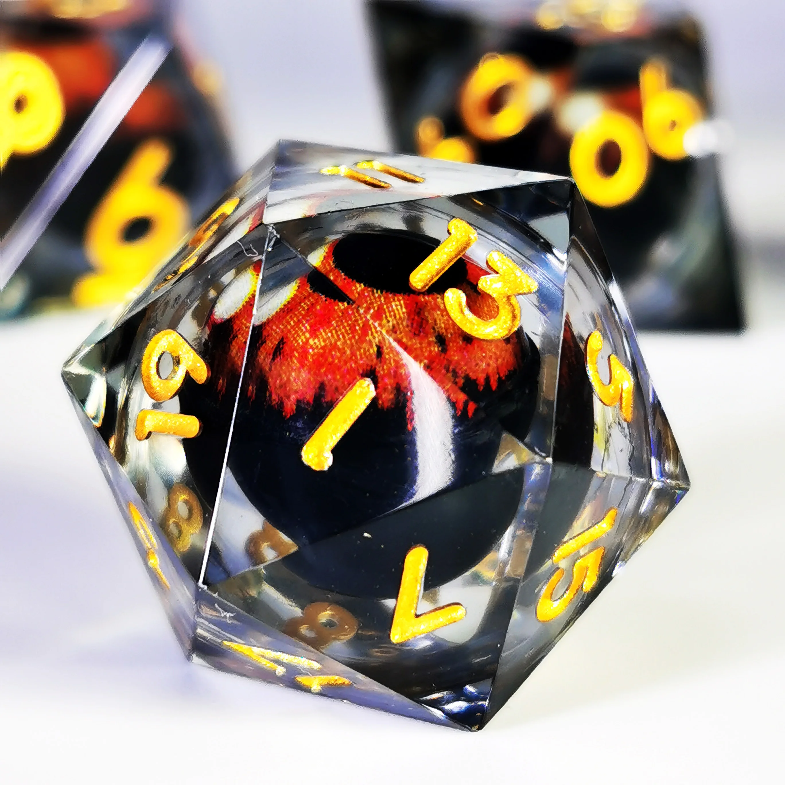 Set di dadi DnD con occhio di drago rotante - 7 dadi poliedrici in resina, numeri gialli trasparenti per giochi RPG D&D