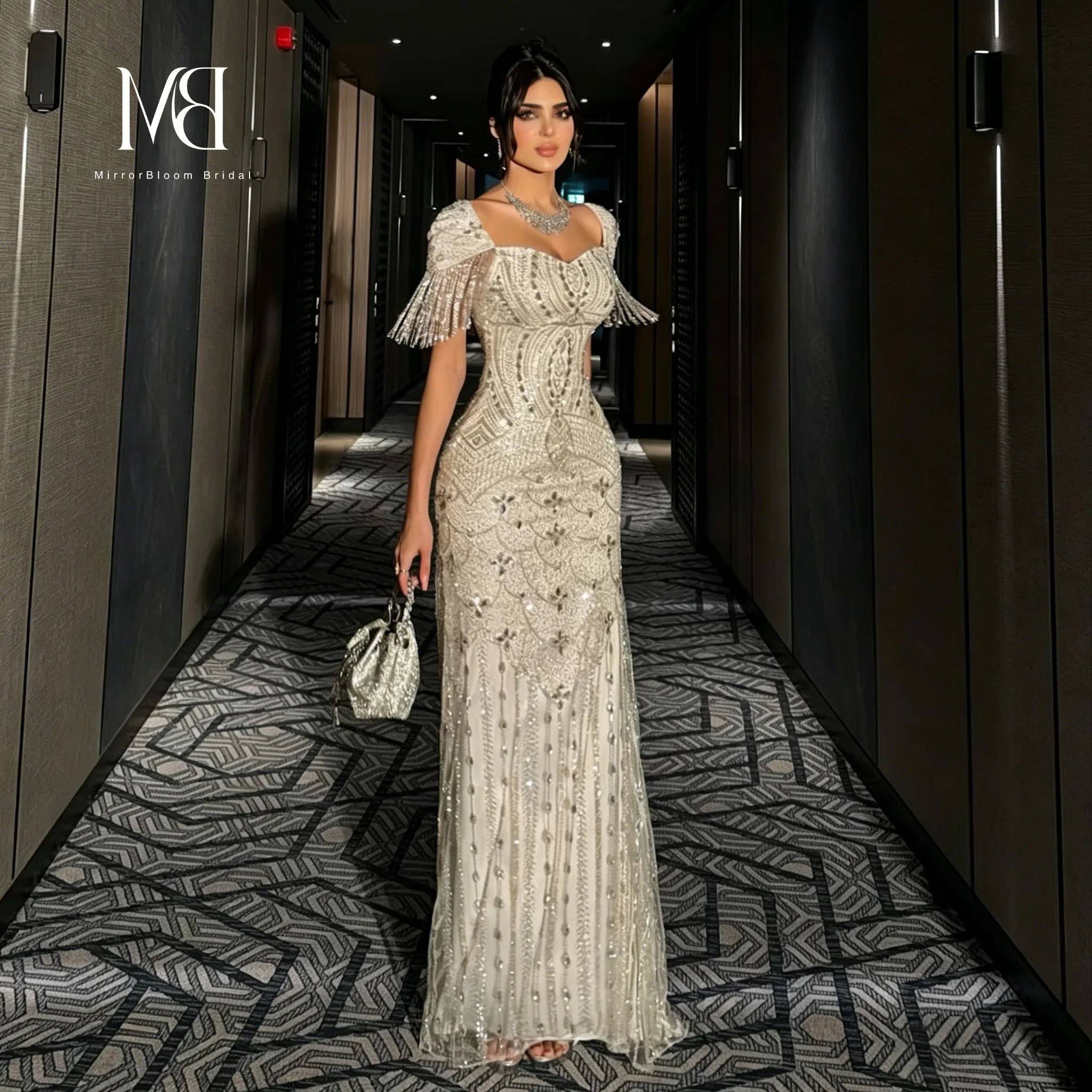 Luxurious Ivory Off-the-Shoulder Strapless Floor-Length Mermaid Formal Gown Featuring Crystal-Embellished Tassel Pendants