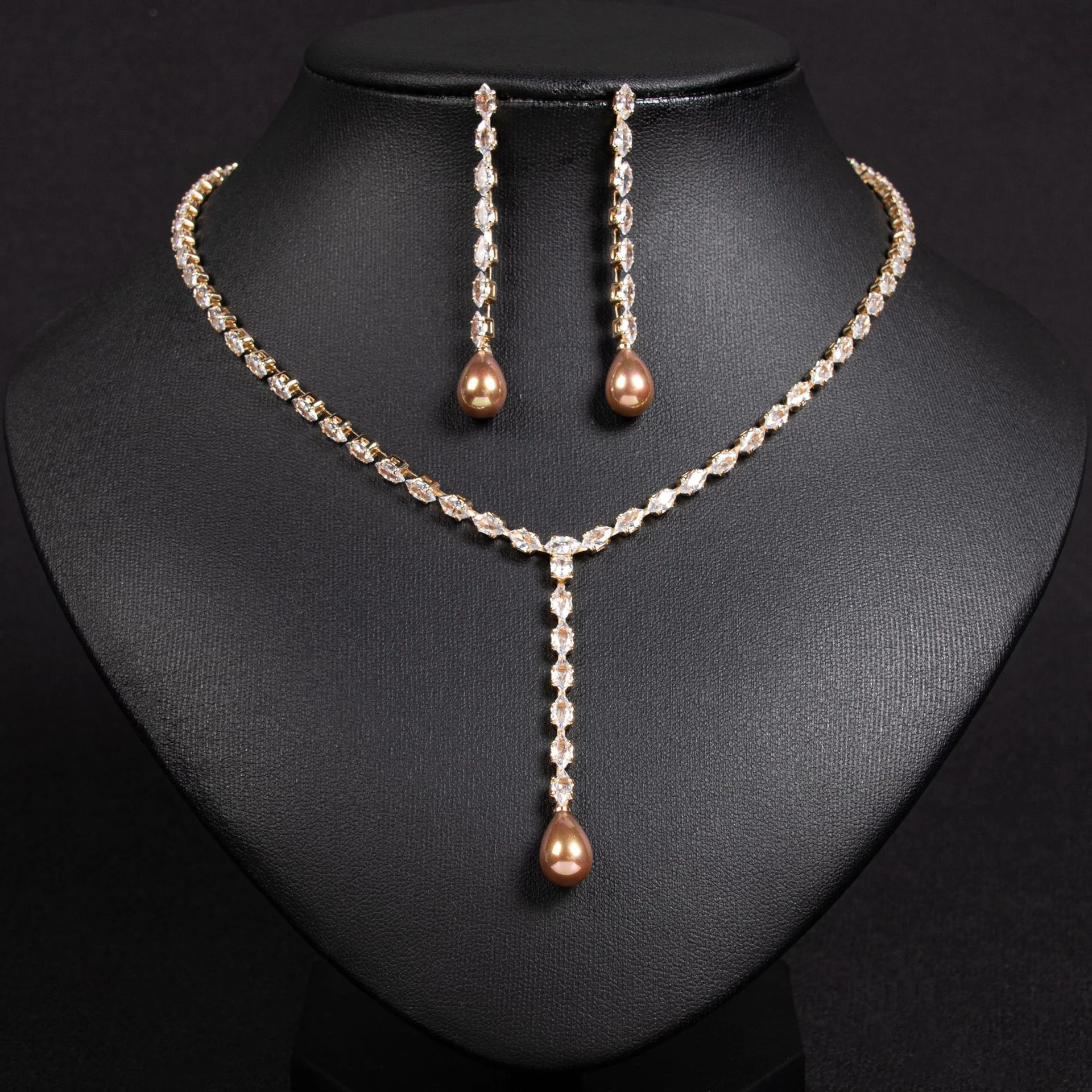 

Korean Simple Slimming Zircon Jewelry Set Shell Pearl Tassel Pendant Necklace Earrings Wholesale For Women