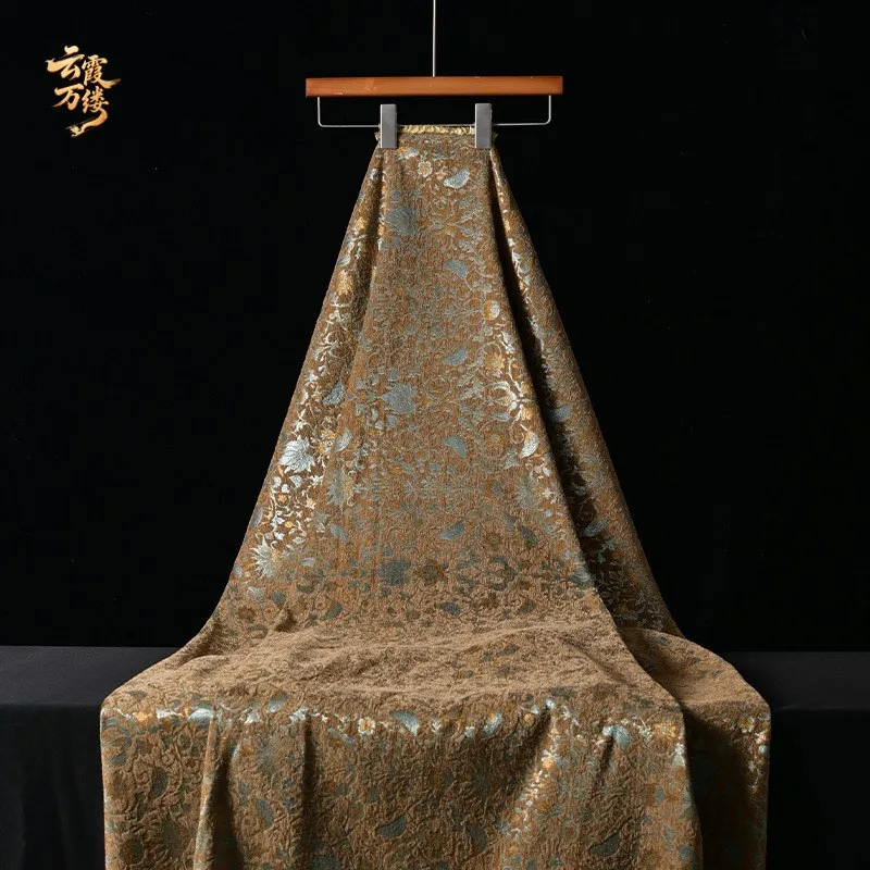The fabric for Chinese-style cheongsam shawl design is made of gold-threaded floral jacquard