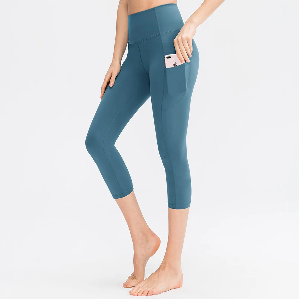 Pantalones deportivos para mujer, pantalones de Yoga con bolsillo, elásticos, ajustados, para levantar la cadera, gimnasio seco, pantalones deportivos para correr, pantalones recortados S-XXL