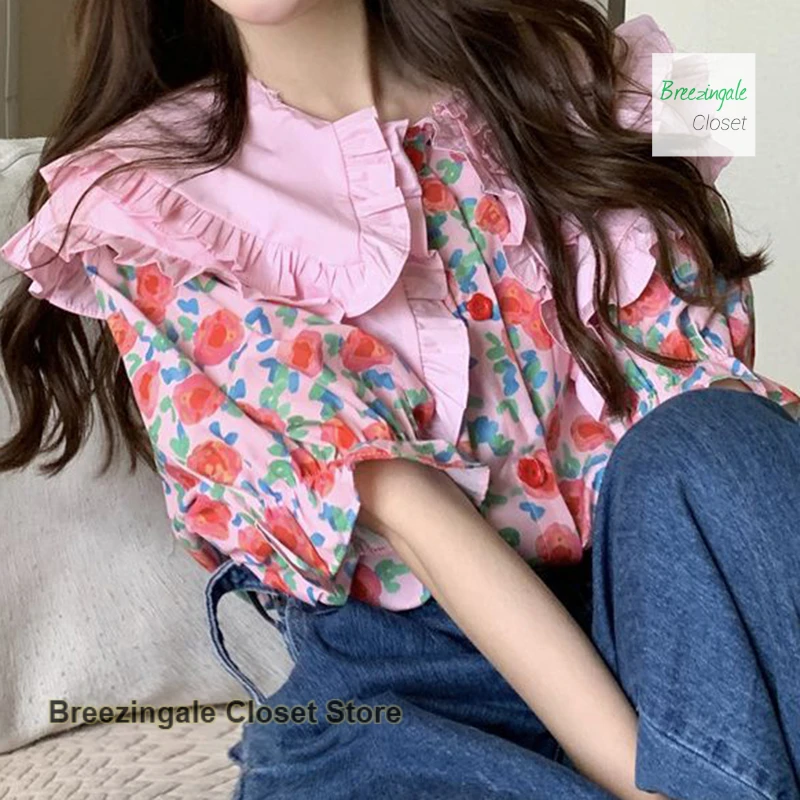 Korean sweet cute little girl doll collar floral short sleeve shirt female summer sweet loose fashion design Joker casual top.