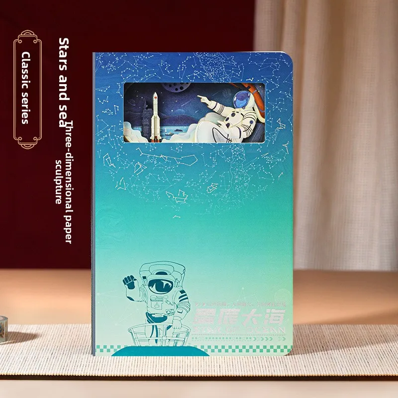 Cuaderno tallado en papel en capas estéreo 3D con temática de estrellas y mar, cuenta de mano, diario de regalo exquisito con dije cósmico