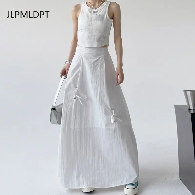 

Korean simple umbrella skirt women's 2025 summer dress new versatile straps bow medium and long high waist casual skirt