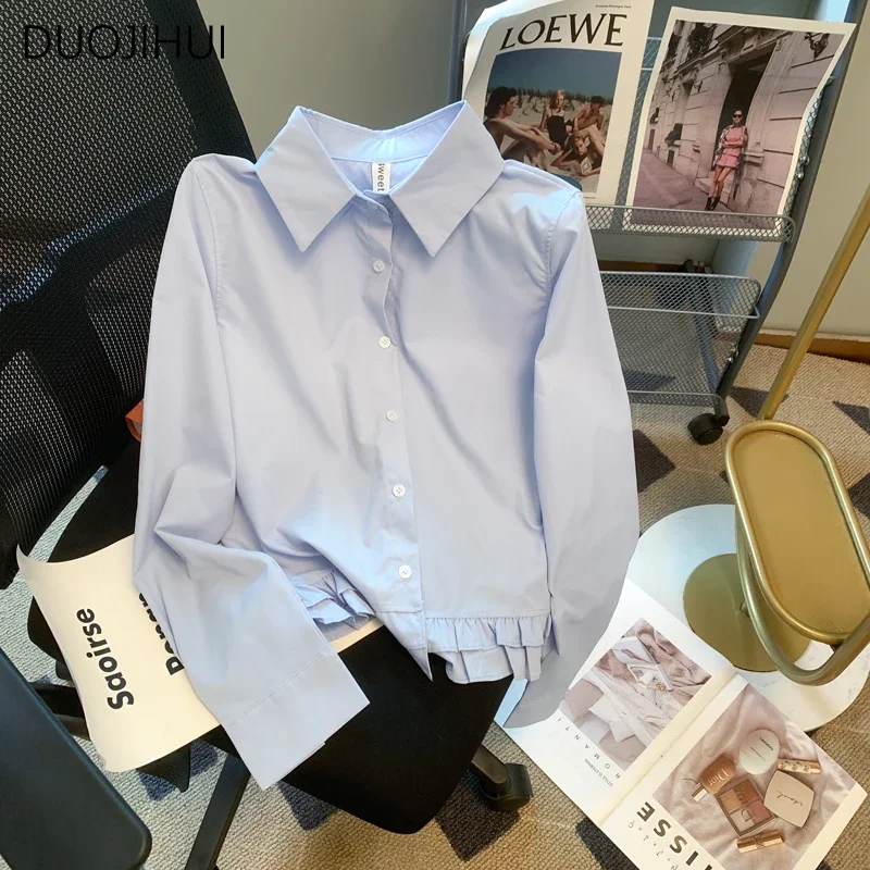 Duojihui เสื้อเชิ้ตแขนยาวสีพื้นแต่งระบายสีน้ำเงินเข้มสไตล์ฝรั่งเศสสำหรับสาวออฟฟิศหรูหราสีทึบเสื้อยืดสตรีเรียบง่าย