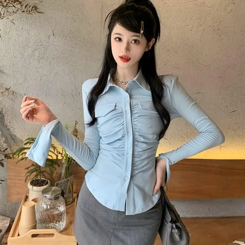 

Autumn new slim fit temperament long sleeved shirt with women's design sense, personalized waist cinching and spicy girl top