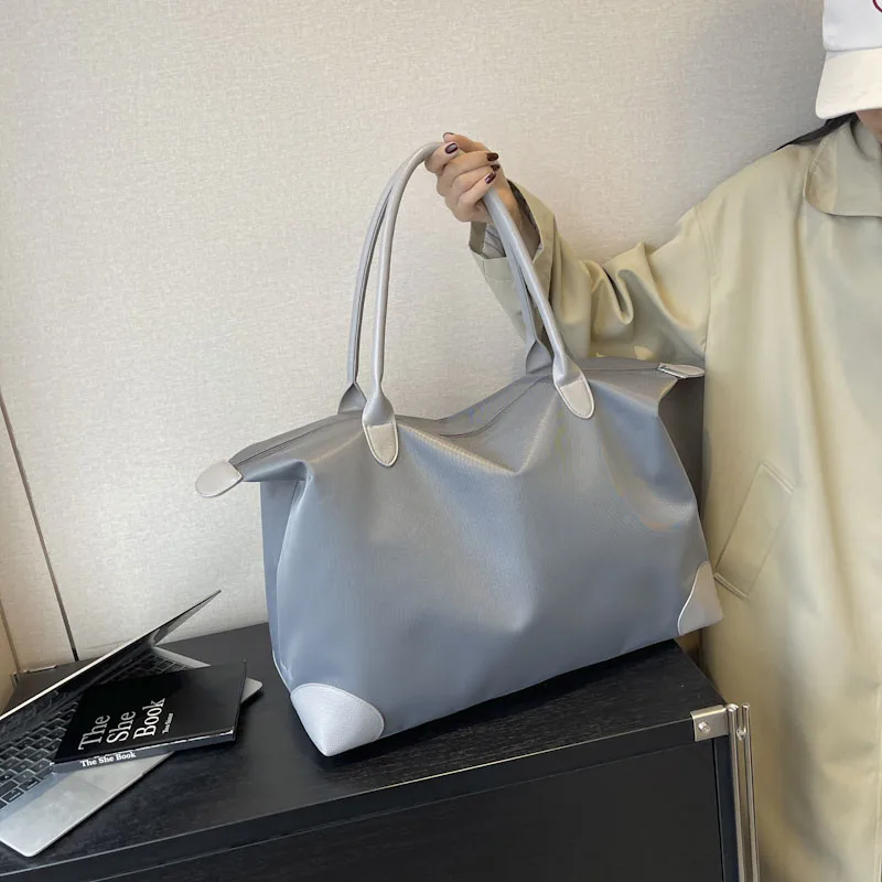 2023 Top-Marke Reisetaschen für Frauen hochwertige Nylon Handtasche Wochenend reisetasche große Kapazität wasserdichte Gepäck tasche