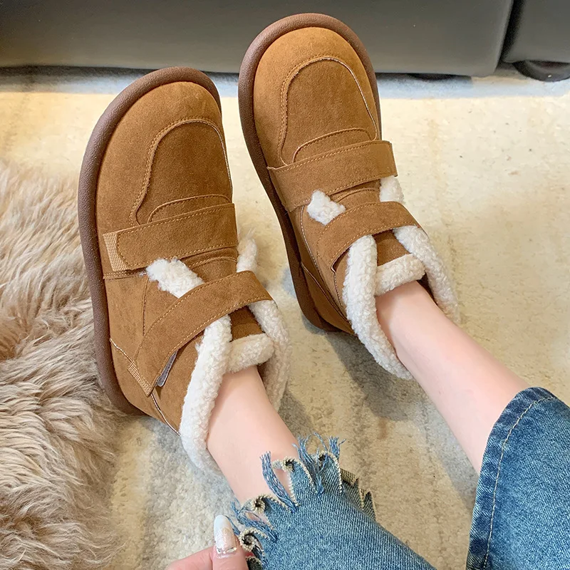 أحذية الثلوج الدافئة سميكة سوليد جلد الغنم للنساء2025New الشتاء نمط الانزلاق على أحذية قطنية سميكة المضادة للانزلاق