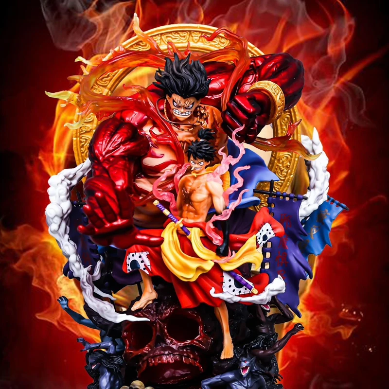 

Коллекционная модель Луффи из One Piece: Король Воров и Королевство Пиратов, а также Луффи с острова Призраков Сакуры.
