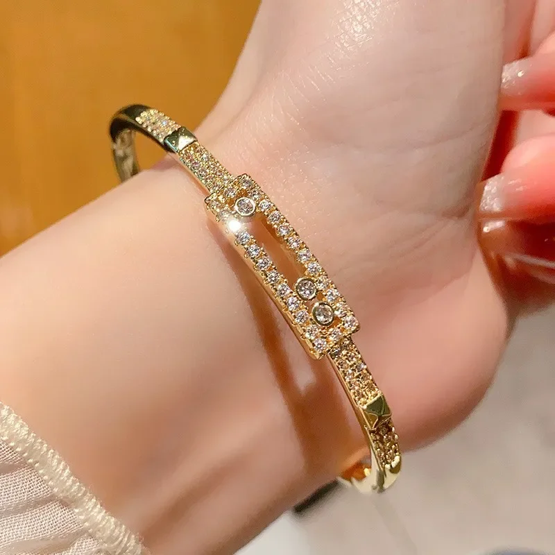 

2025 new A simple and fresh women's bracelet with three rows of zirconium openings and hollowed-out lively diamonds