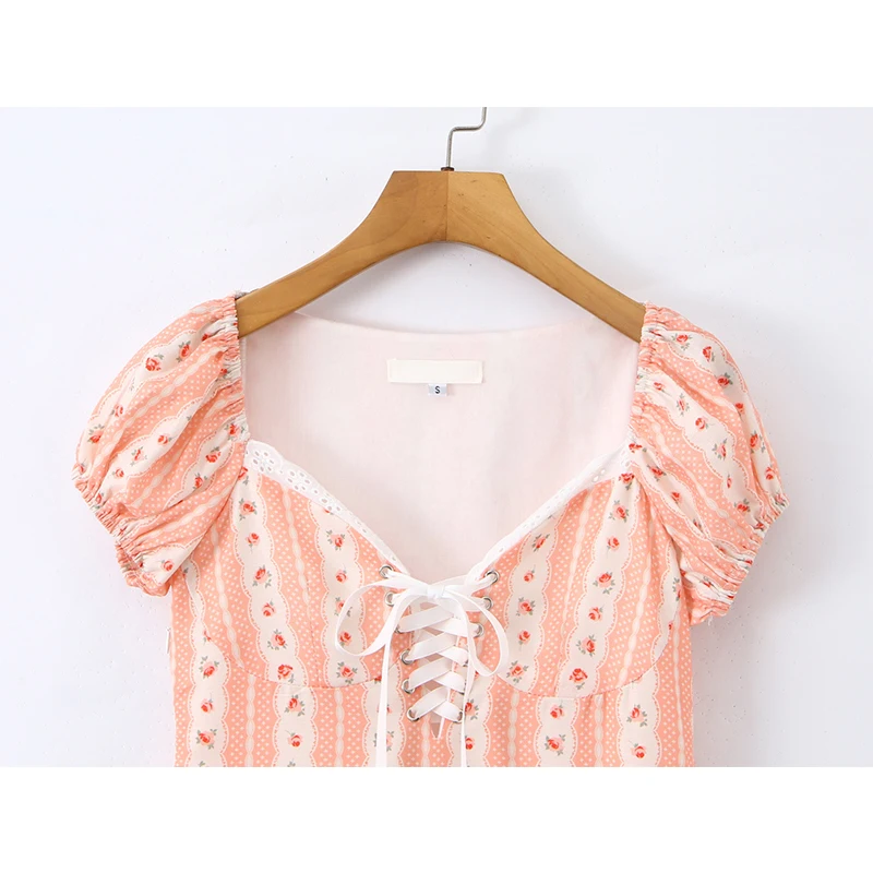 فستان YENKYE برباط أمامي مطبوع عليه زهور للنساء فساتين صيفية صغيرة عتيقة بأكمام منتفخة على شكل حرف a فستان صيفي صغير غير رسمي للإجازات 2026