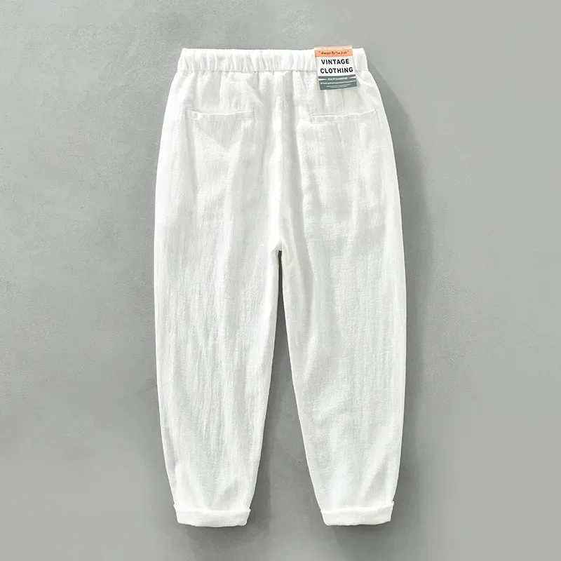 Pantaloni di lino in cotone affusolato Pantaloni casual da spiaggia estivi da uomo Pantaloni in vita elastica con coulisse solida Pantaloni larghi retrò giapponesi
