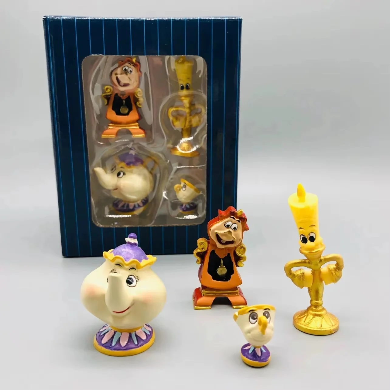 Candelabro de vela de La Bella y La Bestia de Disney, taza de tetera, modelo de figura de acción, colección de muñecos, juguetes de adorno, regalos, 4 Uds.