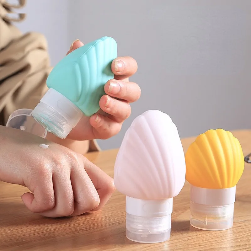 

Travel Portable Shell Shaped Silicone Flip Perfume Cosmetics Lotion Face Cream Bottles Multicolour