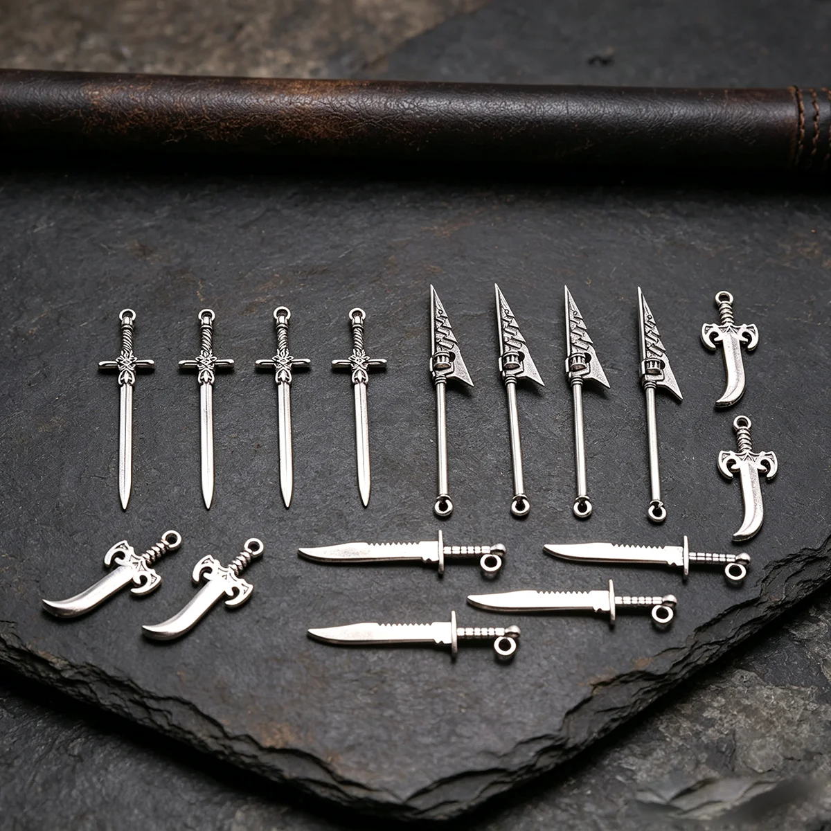 16-Piece Set of Vintage-Style Accessories, Including Carved Cross-Shaped Long Swords, Vintage Spears, Curved Blades, Serrated Small Knives, and Pendant Sets, Suitable for DIY Bracelets, Necklaces, Earrings, and Hanging Ornaments, as Well as Handmade Weaving Materials