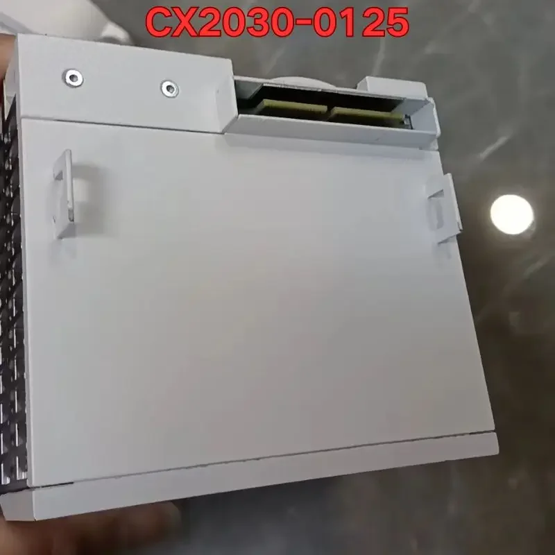 El módulo de control PLC de segunda mano CX2030-0125 es un prueba de función normal