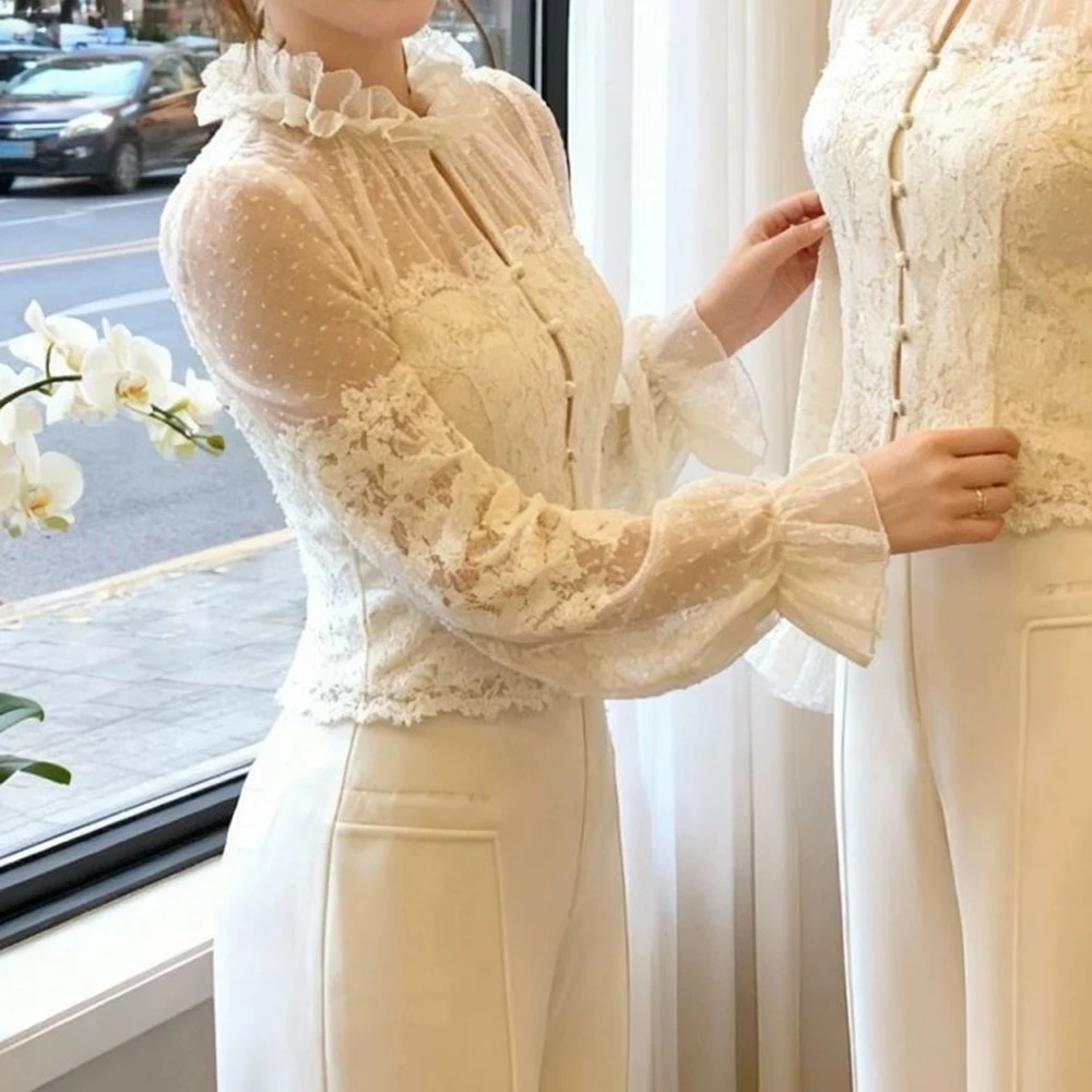 

European big-name high-end sense versatile Korean spring 2026 new top long-sleeved short lace shirt women