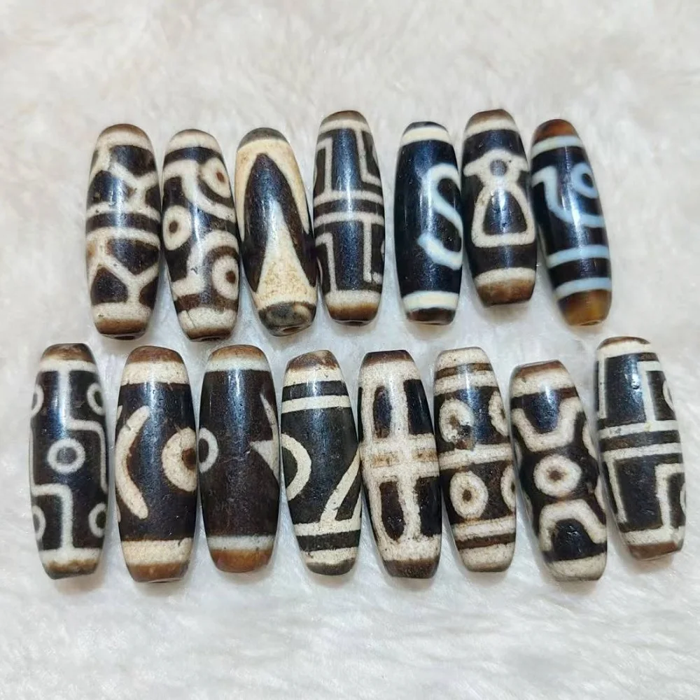 

1pcs Tibetan style infiltration snow domain 3 eyes 9 eyes Noble God of Wealth Agate Tianzhu necklace pendant DIY accessories Dzi