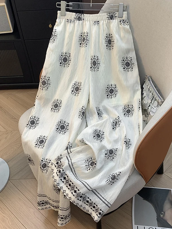 Pantaloni a gamba larga in vita elastica con stampa vintage estiva Pantaloni lunghi dritti casual larghi semplici da donna a vita alta