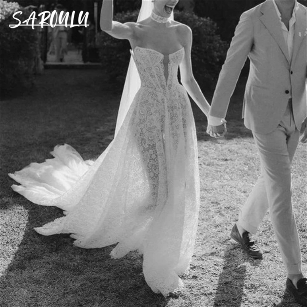 ボヘミアンレースのウェディングドレスビーチストラップレスカスタマイズされたロング花嫁ドレス傑作高品質のブライダルドレスコートトレイン付き