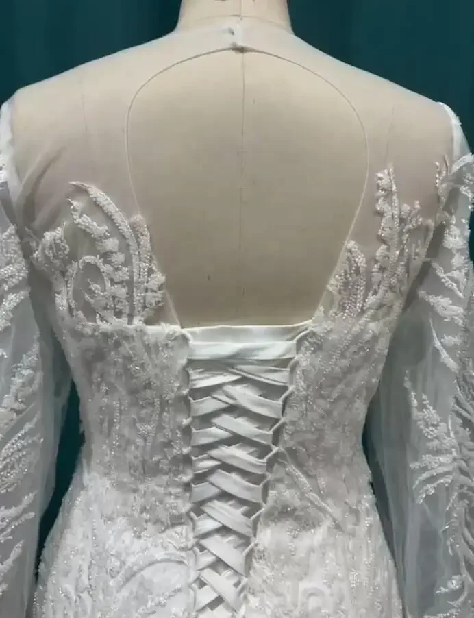 تخصيص 2025 فاخر حورية البحر فساتين لحضور الحفلات الموسيقية بأكمام طويلة ورقبة مستديرة مطرز دانتيل حورية البحر فستان الزفاف مع ذيل قابل للانفصال