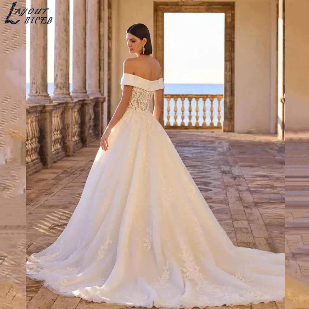 Suknia ślubna o klasycznym kroju, z odkrytymi ramionami, w kształcie litery A, z odkrytymi plecami, aplikacjami, wykwintna suknia dla panny młodej, dekolt w serduszko, tiulowa vestidos de novia, możliwość personalizacji.