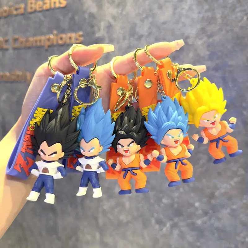 Dragon Ball Z, chaveiro de silicone 3D com alça de pulso, chaveiro com figura de anime Super Saiyan Goku, material de borracha macia e durável, pode ser usado como decoração para carro, mochila ou bolsa, adequado para fãs de Dragon Ball Z.
