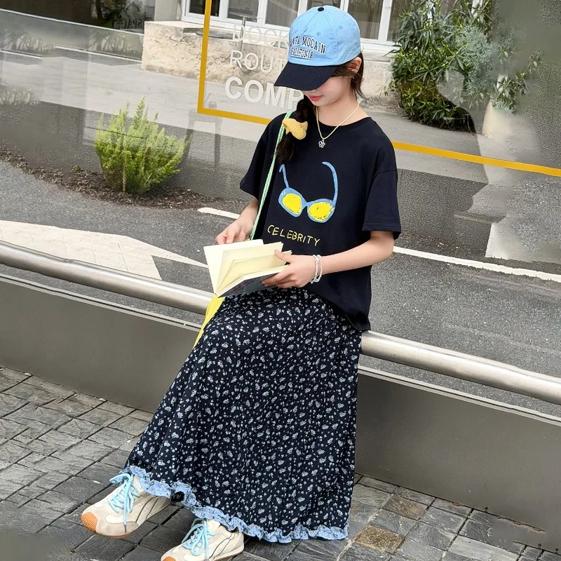 

Children Clothes Girl Summer Cartoon Print Short Sleeve T Shirt And Floral Maxi Skirt Two Piece Set 2026 Sweet Cute