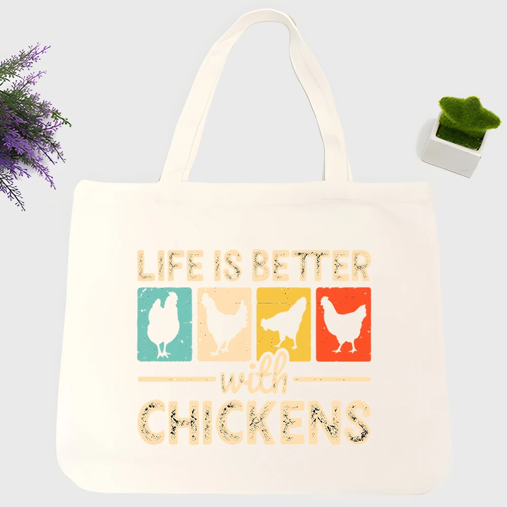 Women's chicken graphic canvas tote bag with vintage text print, ideal for daily shopping and casual outings