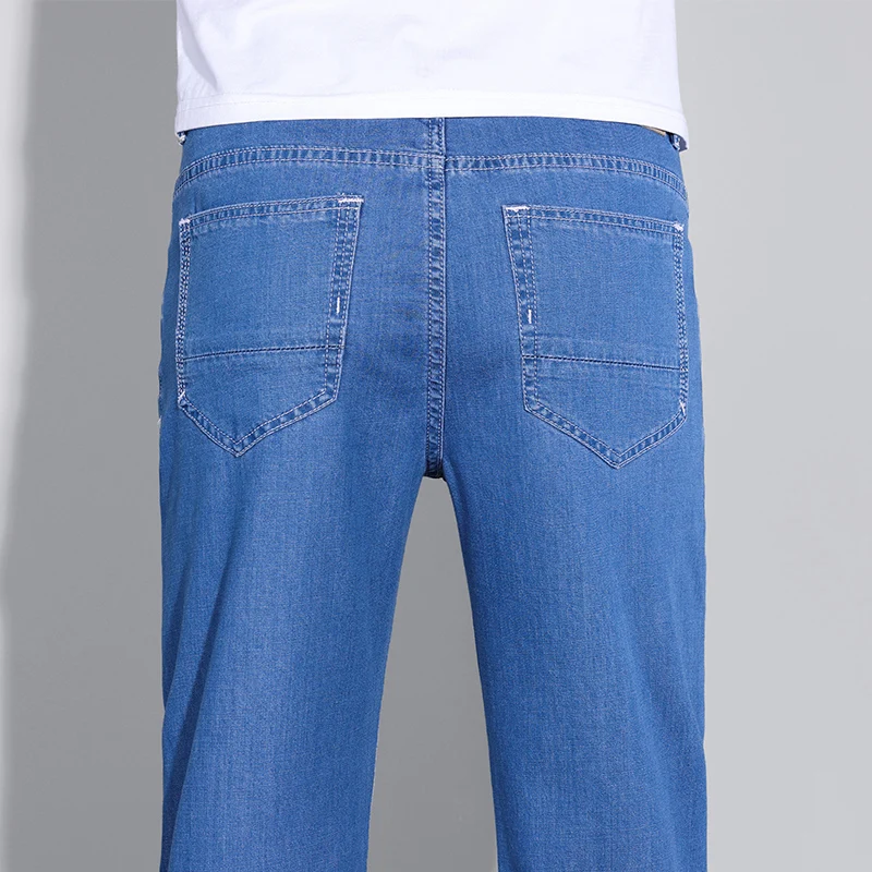 

2026 Spring Summer Thin Lyocell Jeans Fashion Straight Business Work Denim Trousers Comfortable Cool Ice Silk Casual Pants