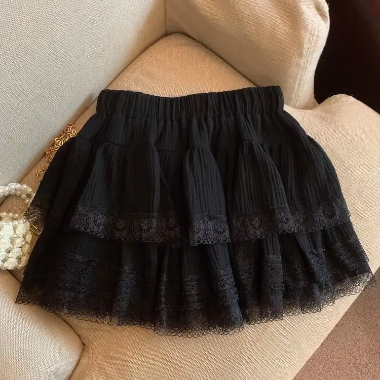Dulce pastel hinchado faldas de mujer kawaii encaje patchwork negro Mini falda Campus Harajuku Casual versátil cintura elástica falda sólida