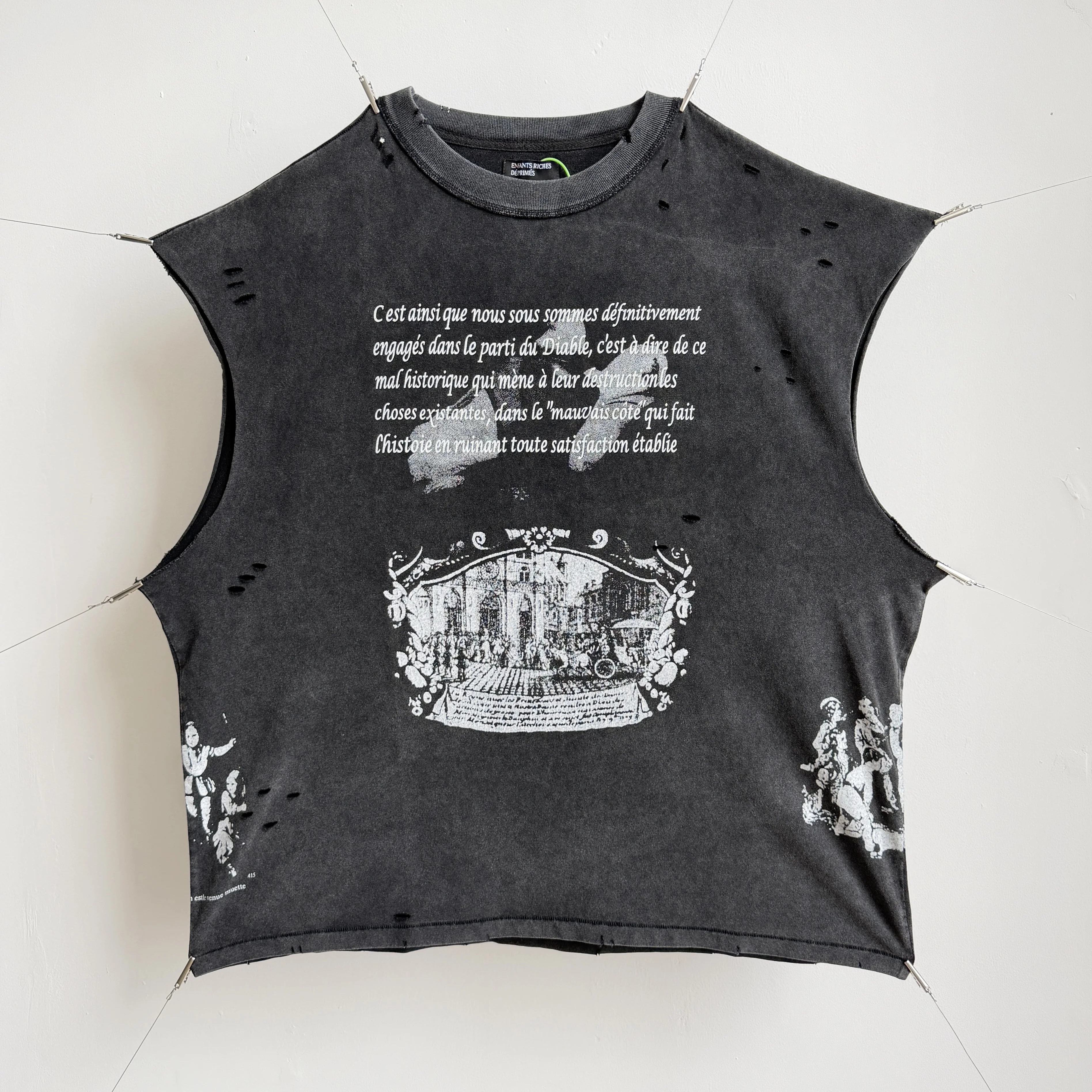 Saint street graffiti-style jacket with knife-cut damage to the back vest