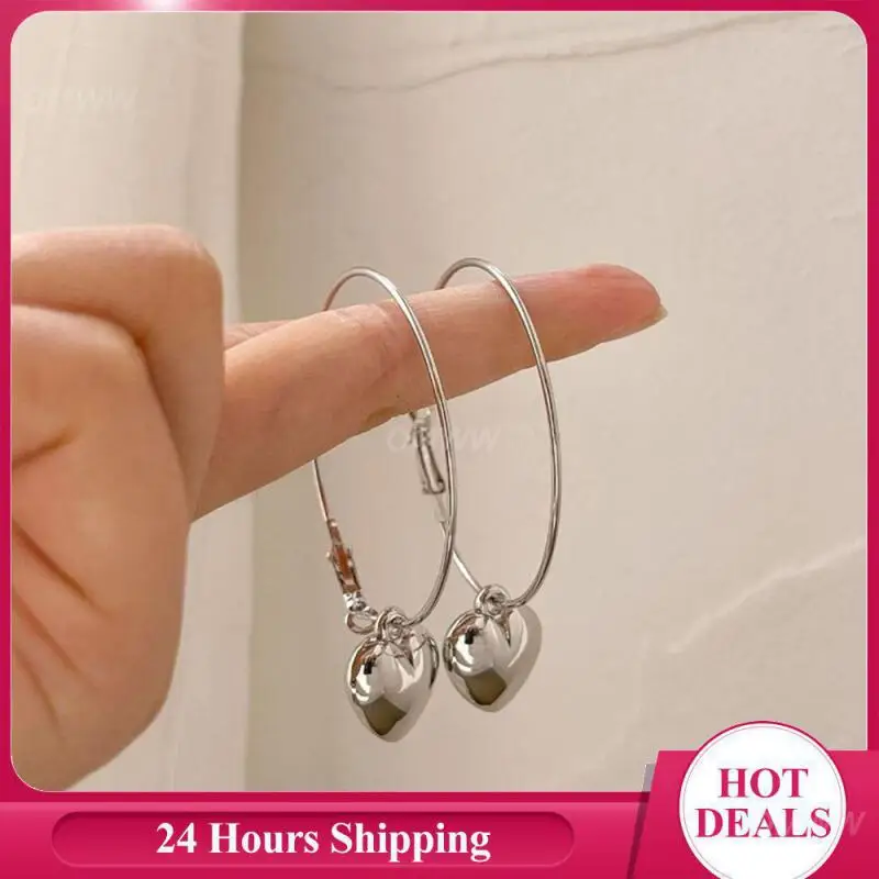 Серьги в форме сердца