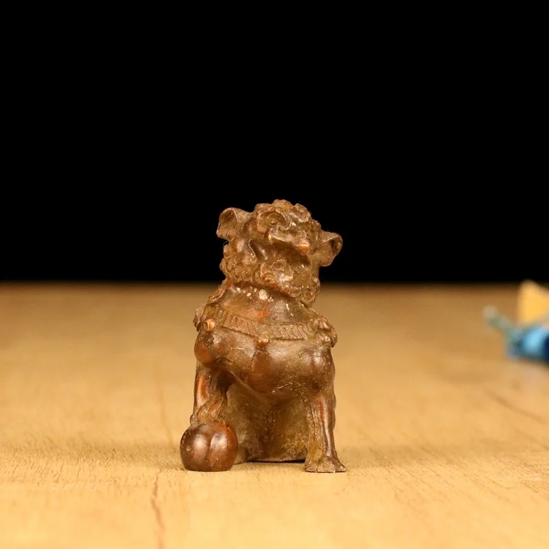 brass lion stepping on a ball fun ornament, creative office gift, scenic area stall small item, desktop d