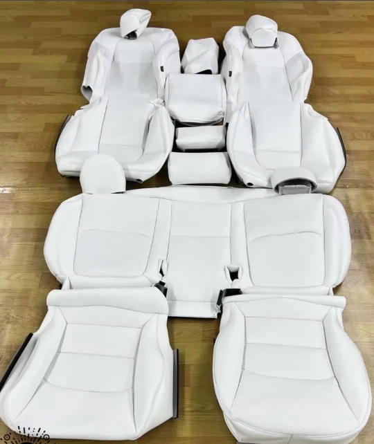 Custom seat covers, total price $180.