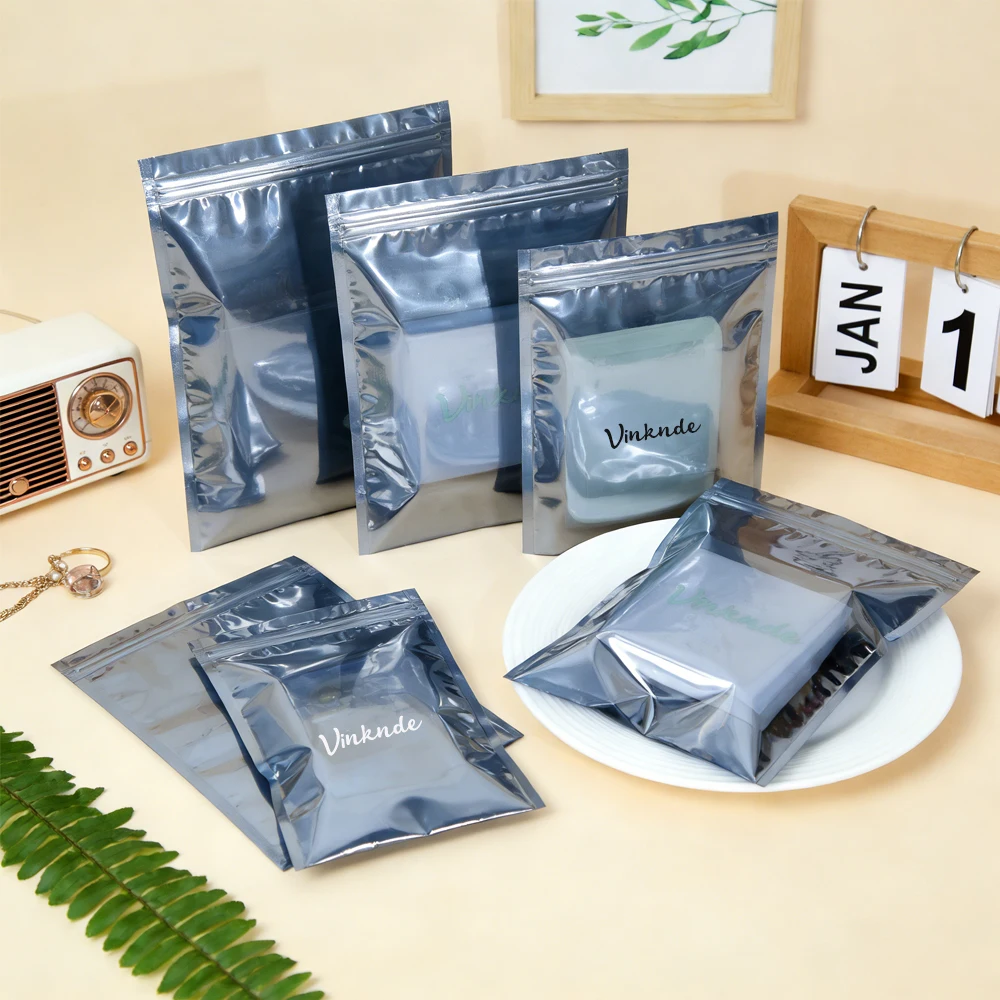 

Многоразовые пакеты-стойки из ПЭТ с двусторонним антистатическим серебристым алюминиевым покрытием, с застежкой-молнией, для пищевых продуктов, с возможностью нанесения логотипа