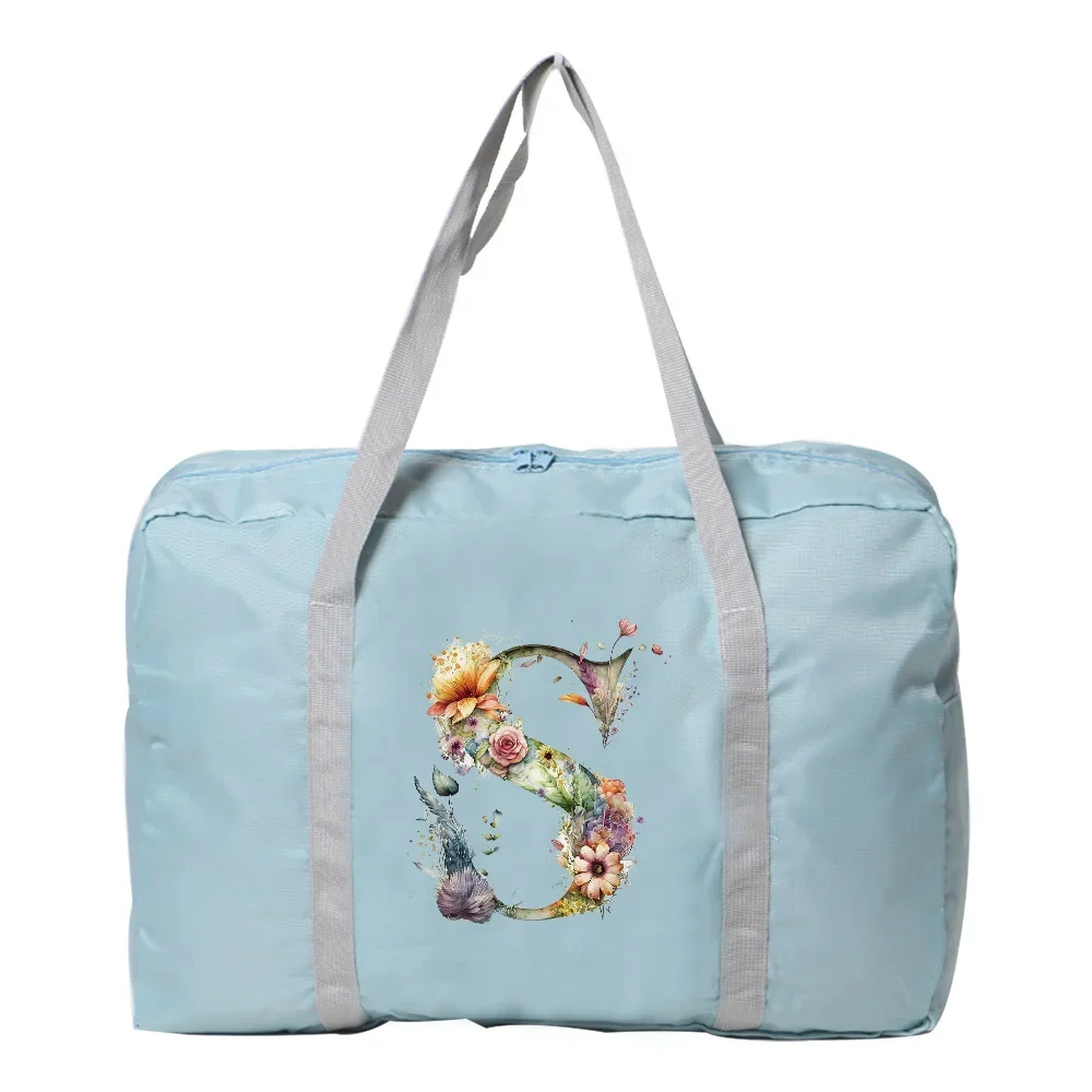 Рисунок 5 - Ручная дорожная сумка с цветочным узором и принтом