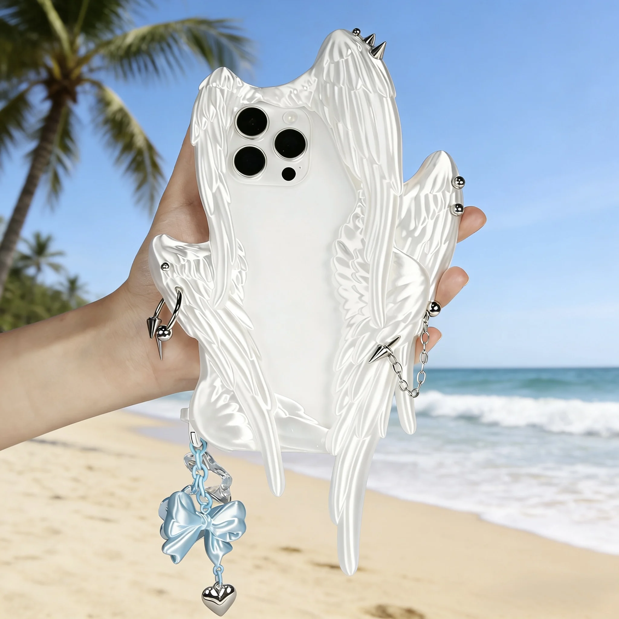 

Customized six-wing angel wings riveted perforated punk phone case, made of soft rubber material, suitable for Apple phones. Shi