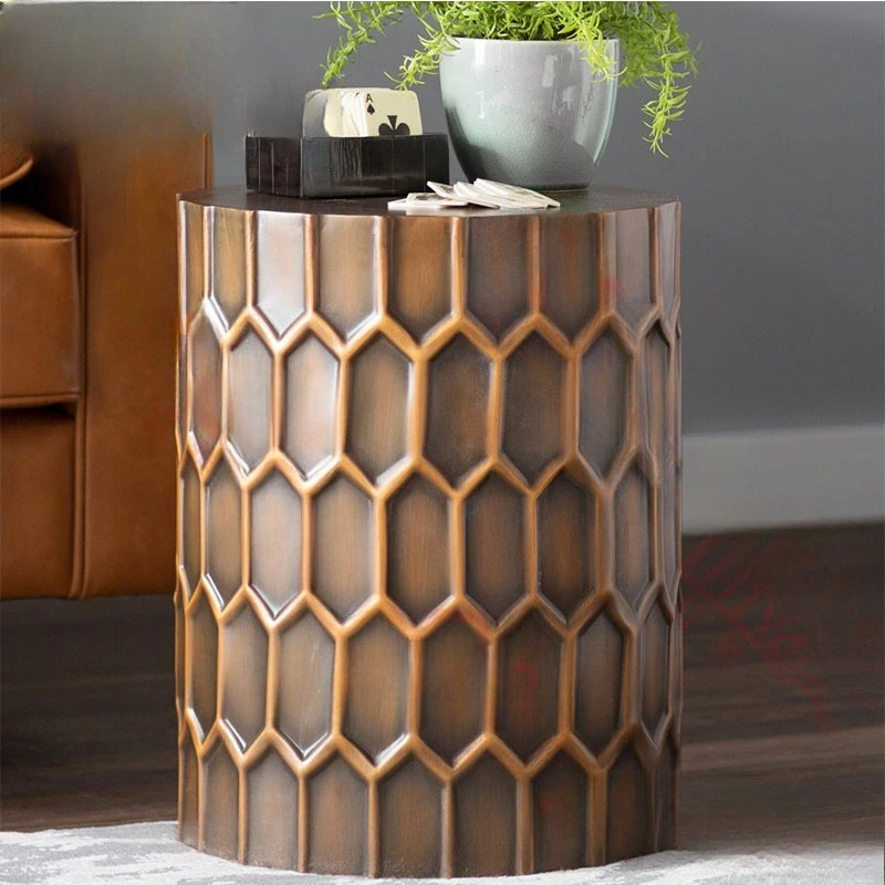 Modern light luxury round honeycomb, grain fiberglass coffee table, retro copper color in the living room
