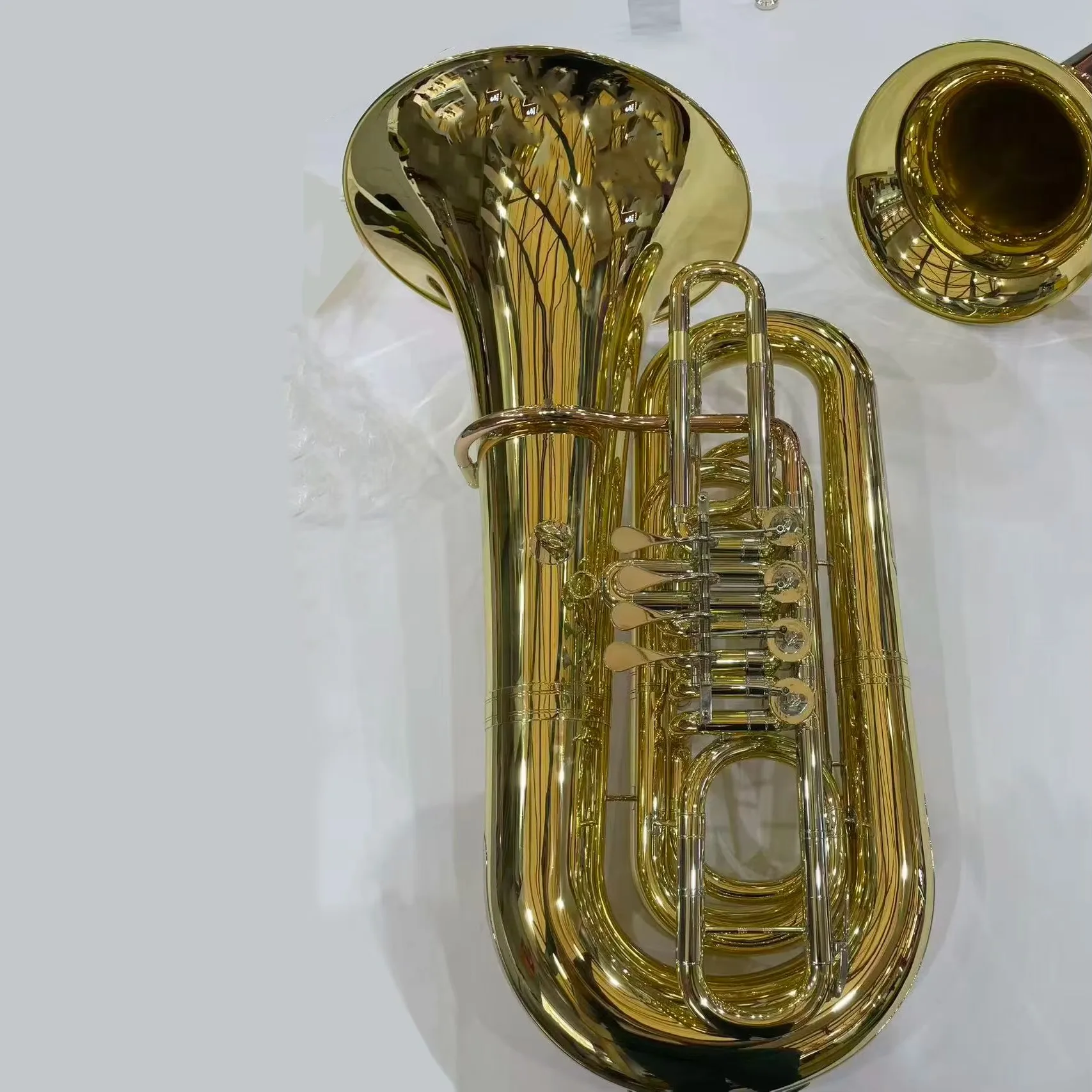 Higher OEM manufacture yellow brass musical instrument professional playing 4 key rotary tuba from China
