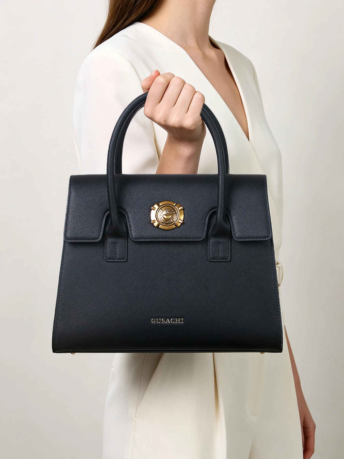 2026 new luxury ladies' handbags in summer, Kong Quelan-shaped hand-held handbags, advanced sense of palmprint temperament, comm