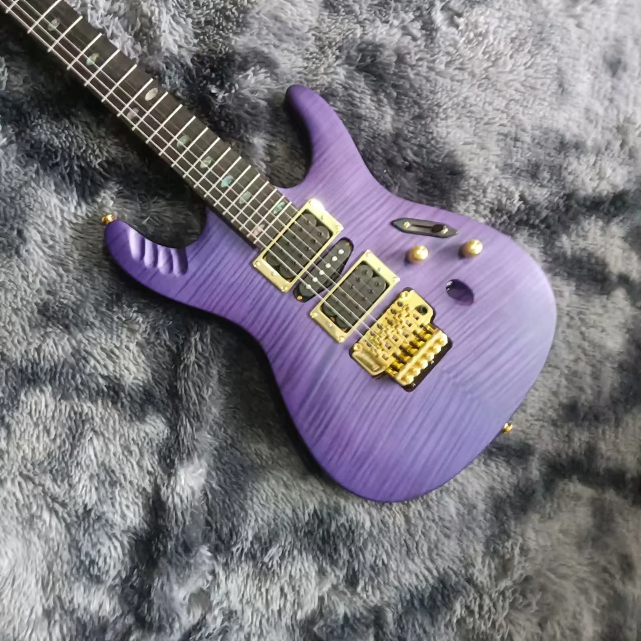 High end customized purple electric guitar, professional playing instrument, high aesthetic value