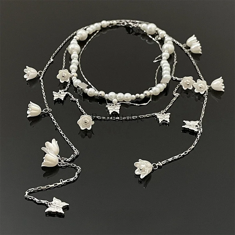 

Double stacked pearl butterfly flower 2024 new light luxury niche collarbone chain tide