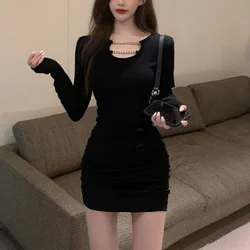 Autumn Winter New French Black Hollow Out Design Chain Tight Waist Wrap Hip Slim Bottom Dress O-Neck Folds Long Sleeved Dresses