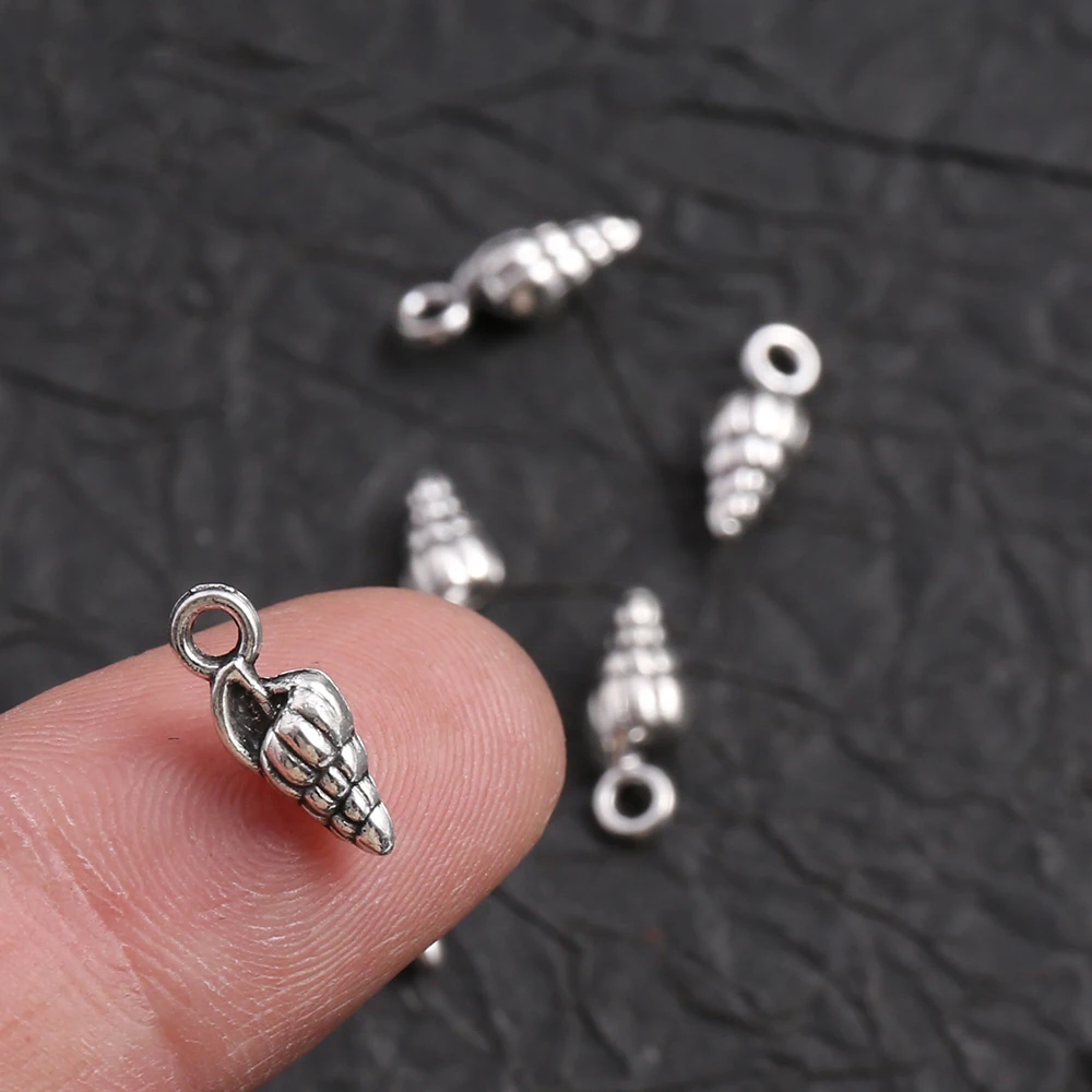 50 Mini Conch-Shaped DIY Handmade Pendants, with Spiral Texture That Replicates the Feel of Ocean Shells, Come with a Hanging Loop for Easy Attachment, Can Be Used to Make Bracelets, Necklaces, Key Pendants, and Seaside-Style Accessories Suitable for Summer Ocean-Themed Crafts view 5