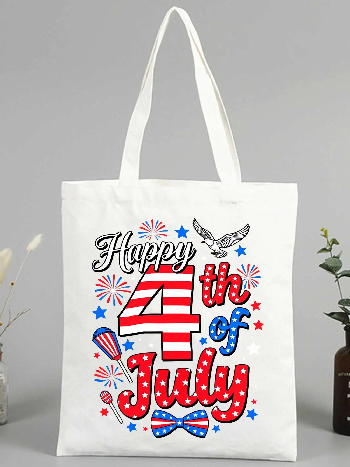 Women's 4th of July eagle and fireworks print canvas tote bag, ideal for summer celebrations and casual outings