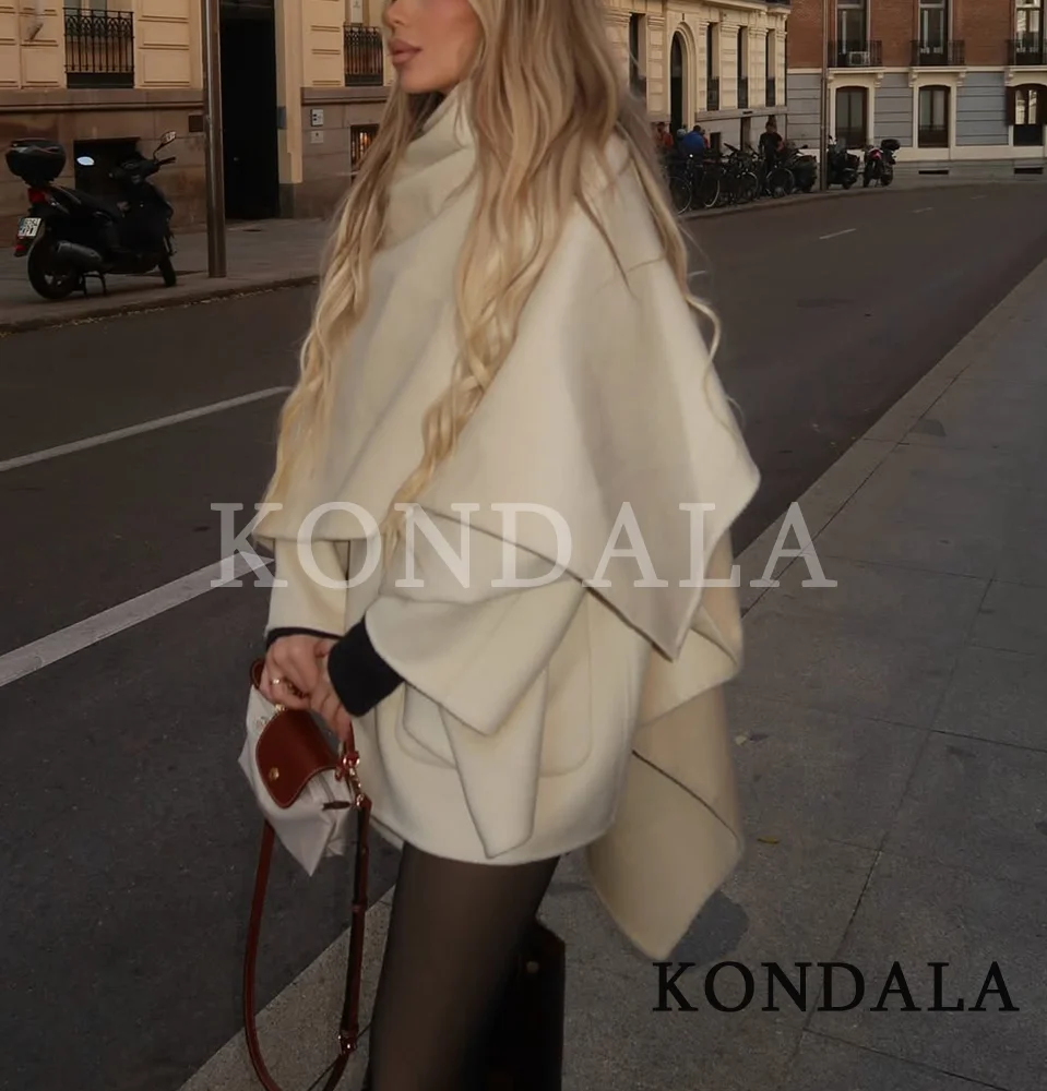 เสื้อคลุมผ้าคลุมไหล่สีเบจแบบหรูหราของ KONDALA เสื้อคลุมผ้าผสมสำหรับผู้หญิง มีกระเป๋า เสื้อคลุมทรงหลวม สไตล์เคป แฟชั่นฤดูใบไม้ร่วง-ฤดูหนาว 2026 เสื้อคลุมผู้หญิงสไตล์ไฮสตรีทสุดอินเทรนด์