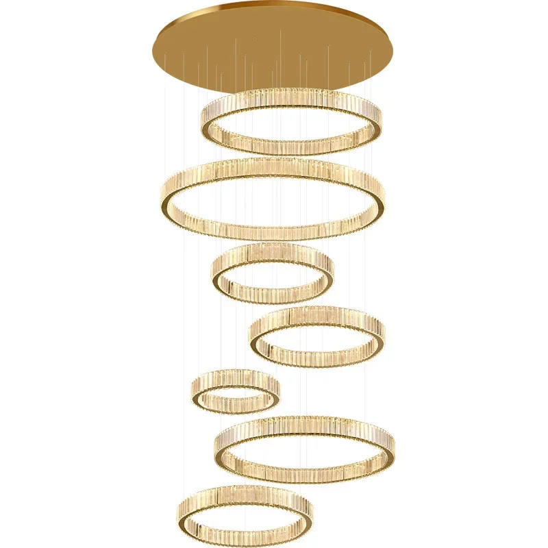 

Large chandelier in the living room of the building, modern simple hollow multi-storey staircase lamp, duplex building villa